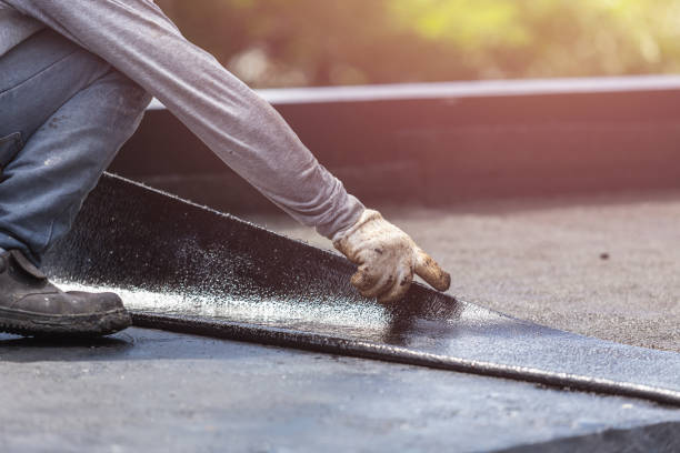 Professional Basement Waterproofing technician working in Ramer, AL